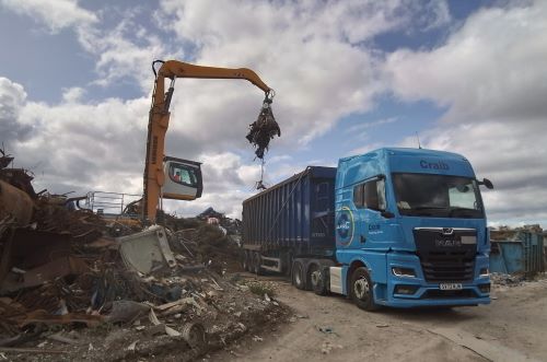 Craib truck being loaded with scrap.