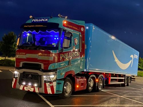 Pollock cab towing Amazon trailer.