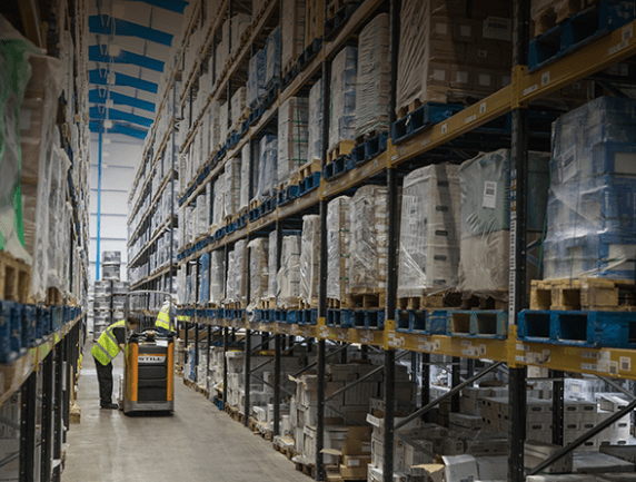 warehouse racks full of stock.