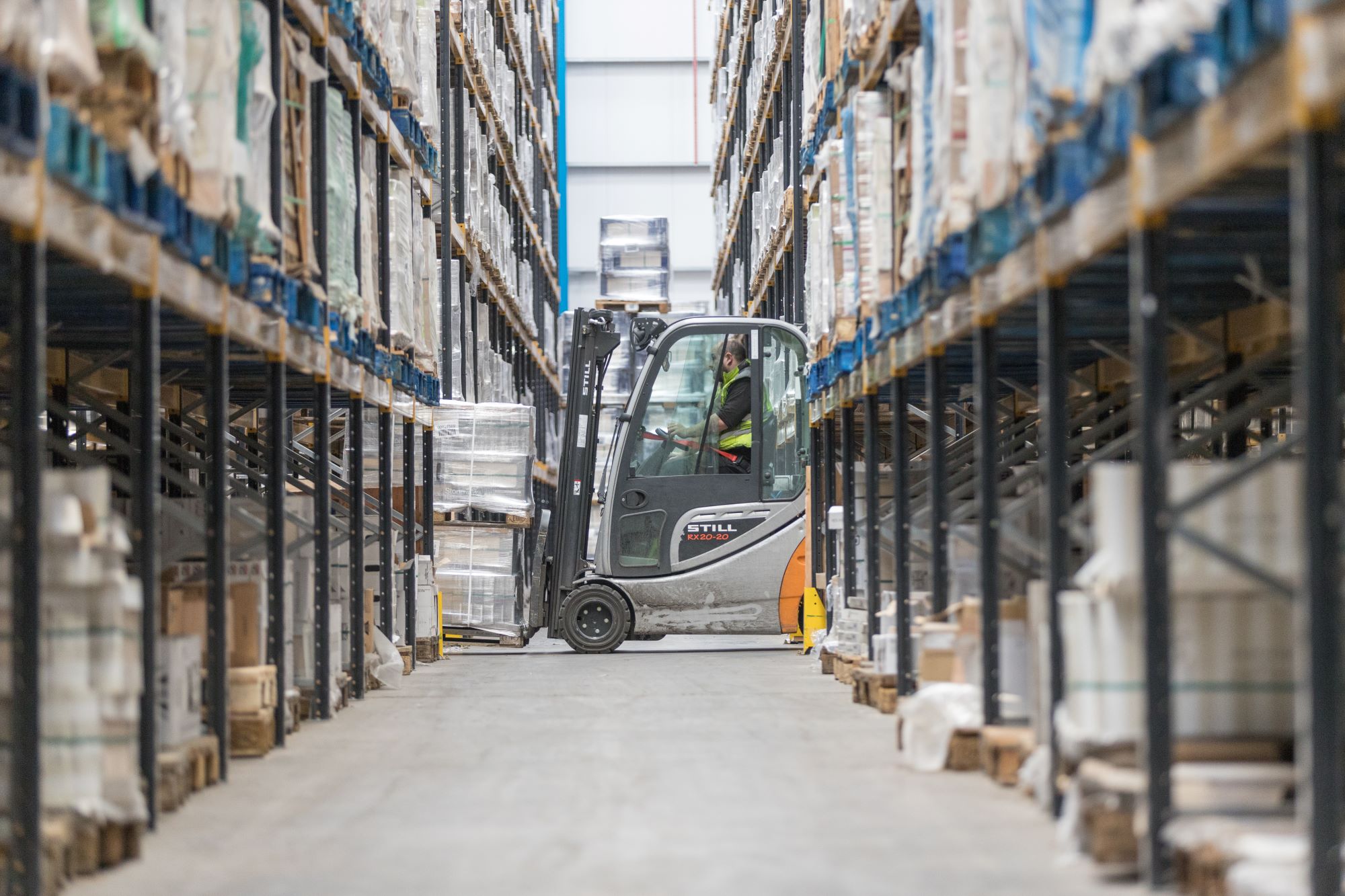 Forklift in warehouse.